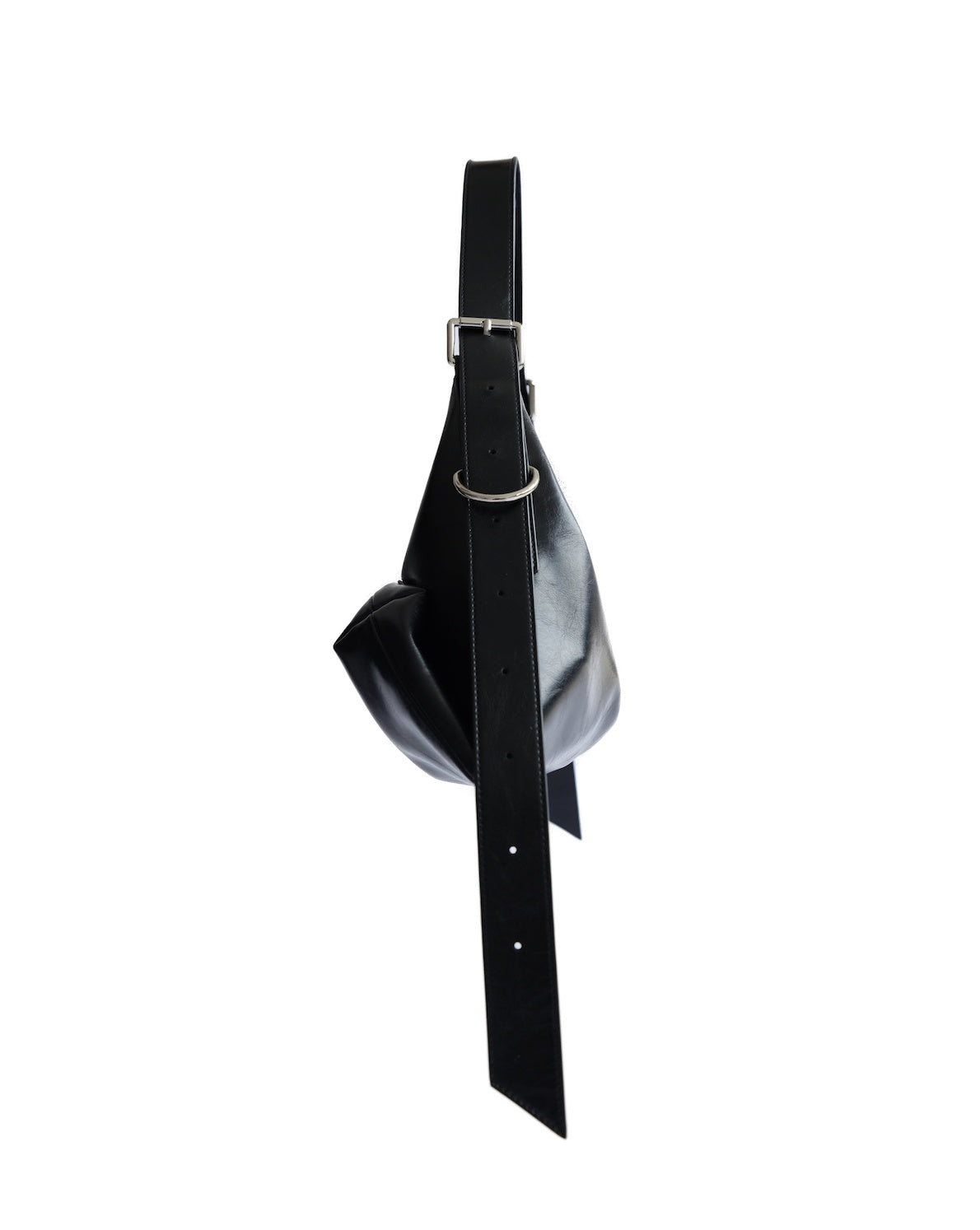 Side view of the MAX+min Maximum Bag, a black leather hobo work bag with long adjustable strap.