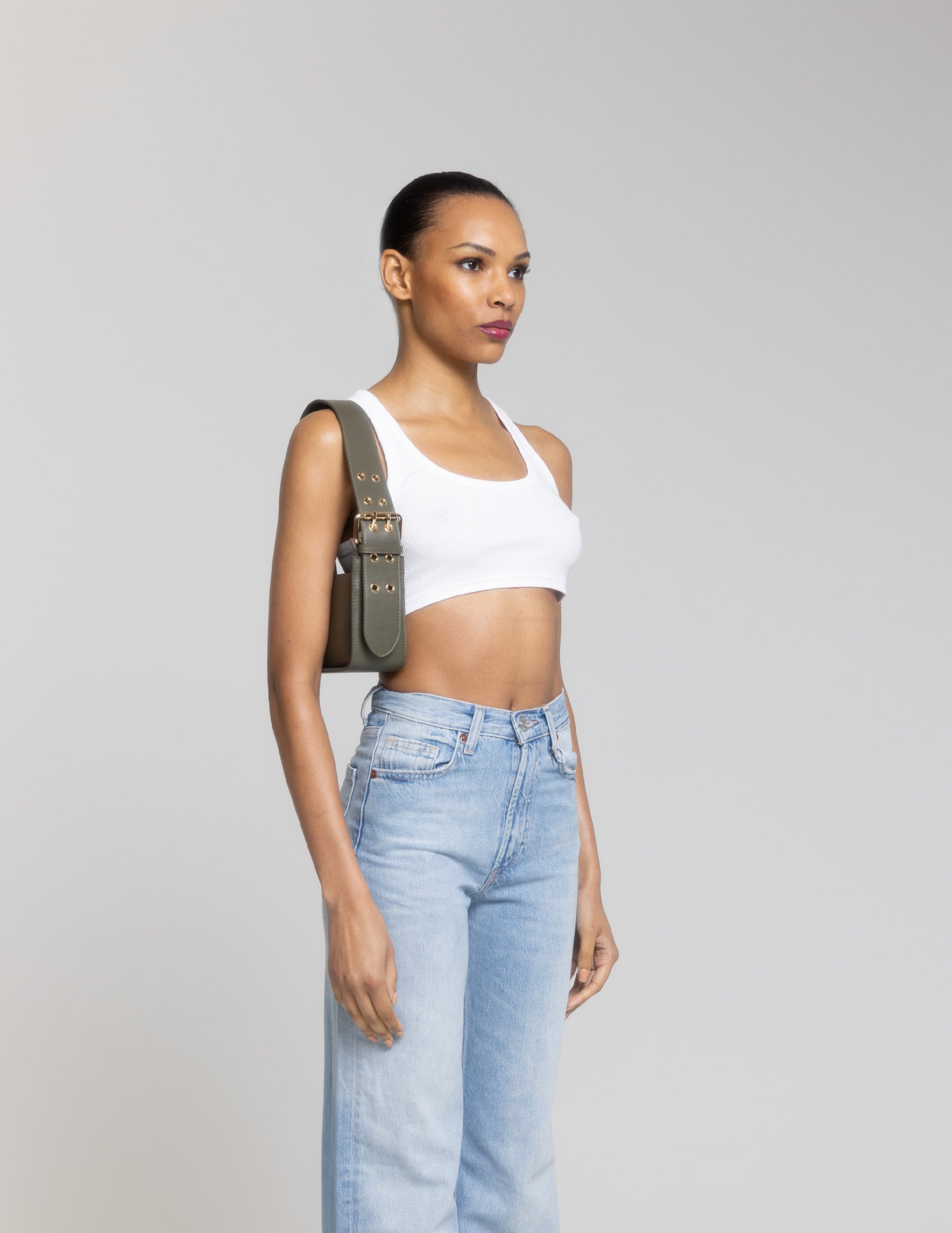 MAX+min Brooklyn olive leather shoulder bag styled on body.