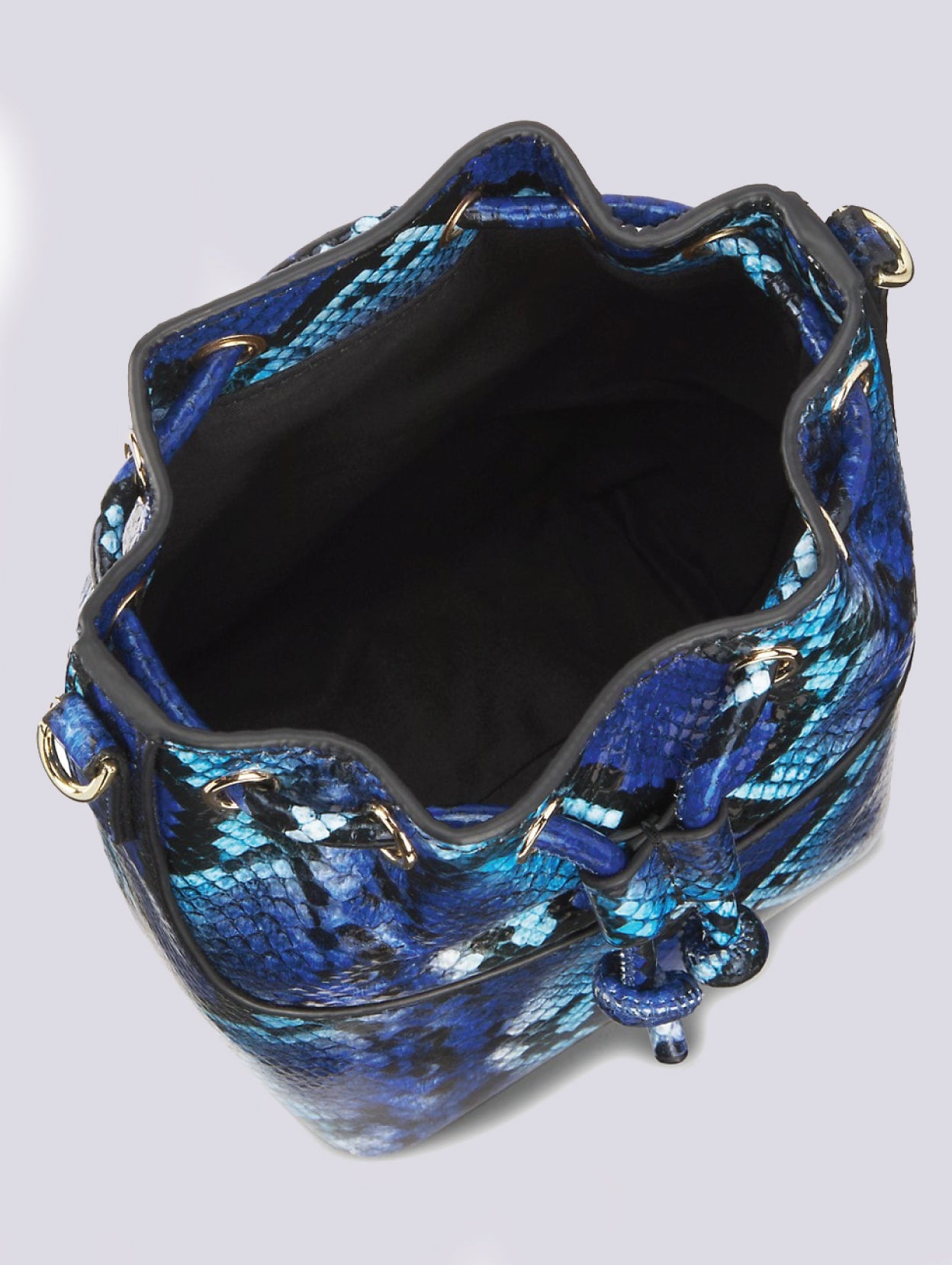 Interior of the MAX+min Bonnie snakeskin leather bucket bag.