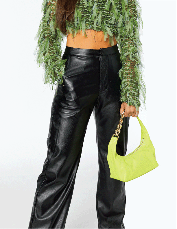 Woman carrying MAX+min Randi Lime leather hobo bag