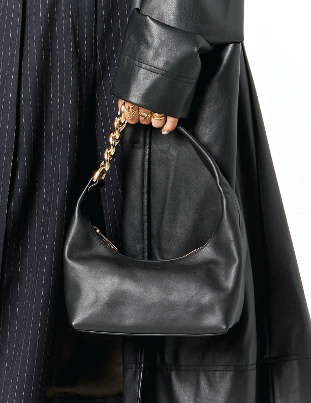 MAX+min Randi black leather hobo bag styled on body.